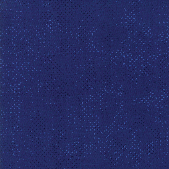 Textured navy blue fabric with a pattern of small tonal speckles