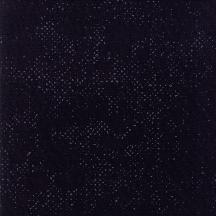 Textured black fabric with a pattern of small tonal speckles