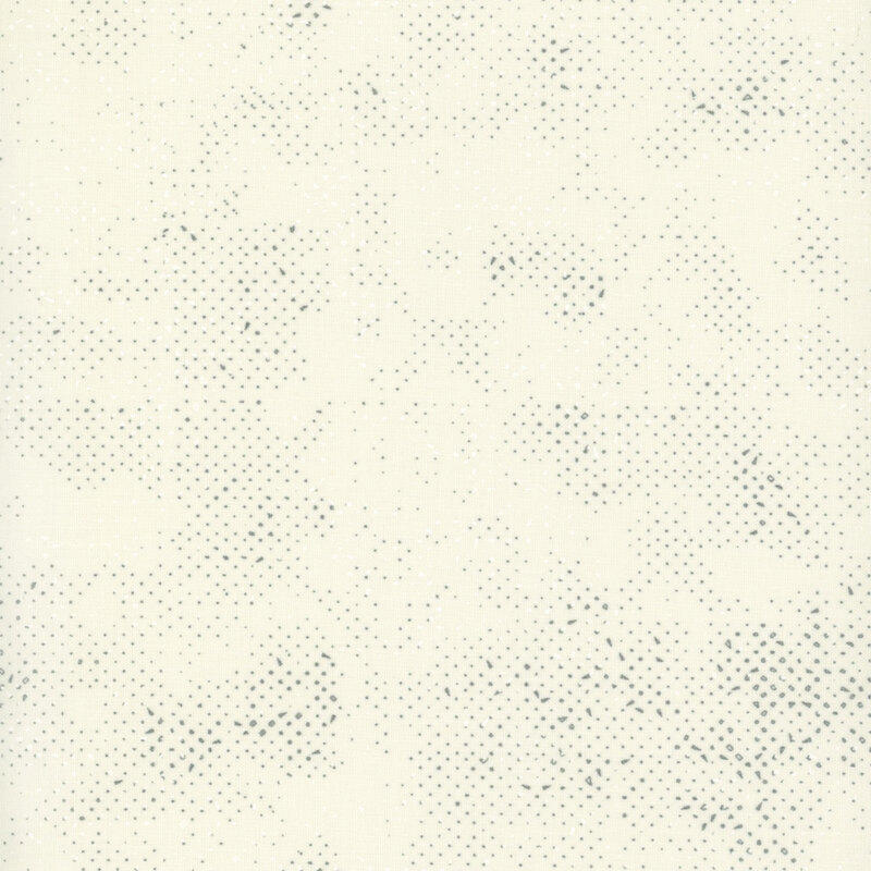 Textured cream fabric with a pattern of small speckles