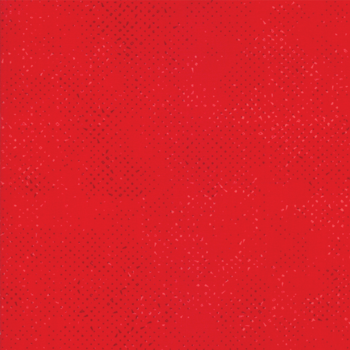 Textured bright red fabric with a pattern of small tonal speckles