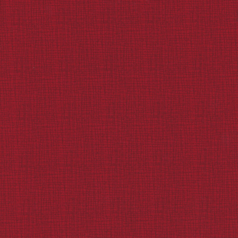 Red textured fabric with a subtle grid pattern.