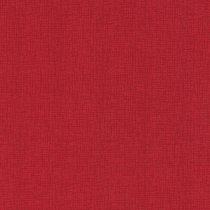 Solid red textured fabric background.