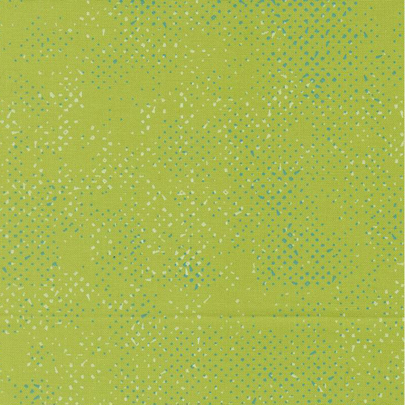 Textured leaf green fabric with a pattern of small speckles