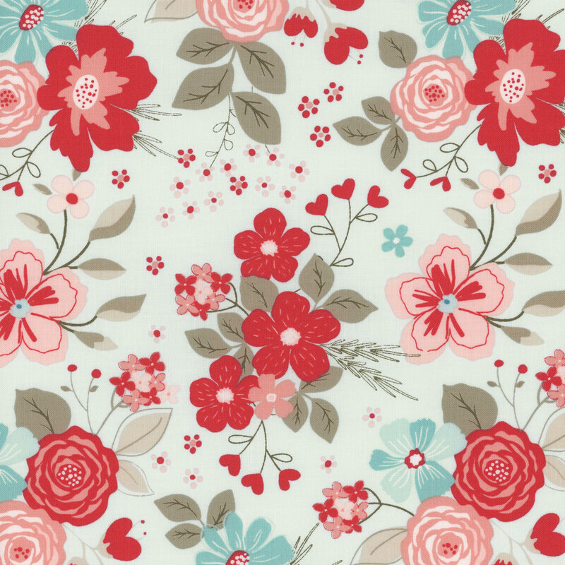 A repeating fabric pattern of colorful floral designs featuring red, pink, and blue flowers on a light background.