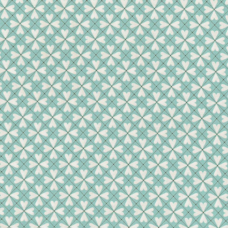 Aqua fabric with hearts in a rotating design resembling flowers.