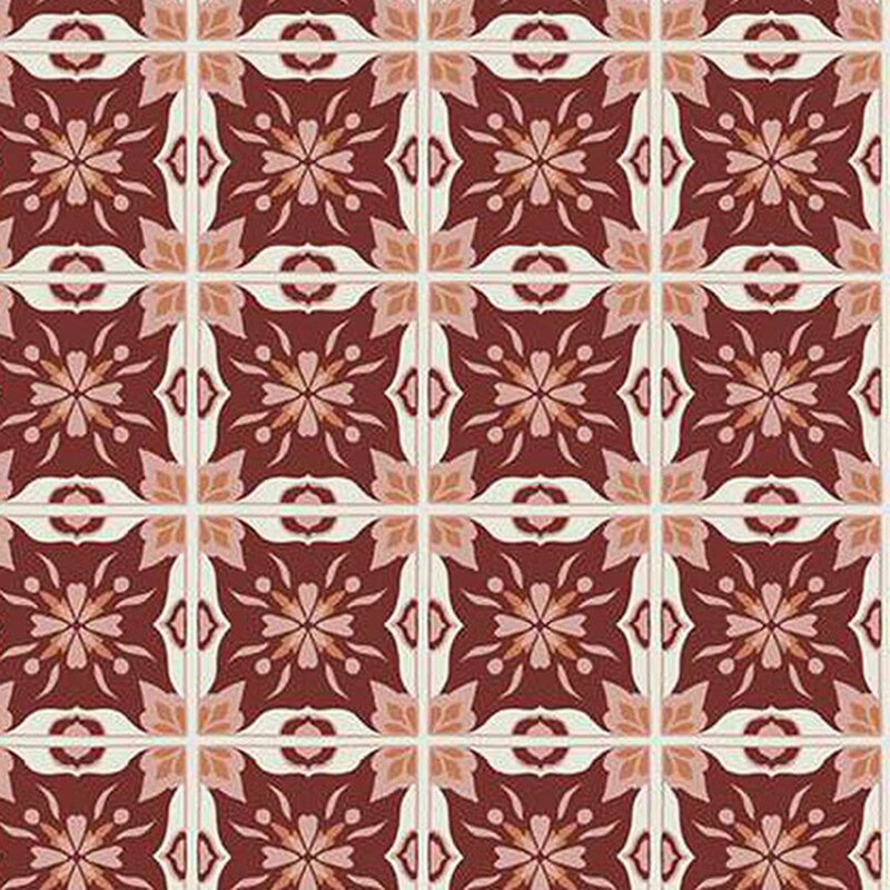 fabric pattern of abstract shapes arranged similar to a plaid on a maroon background