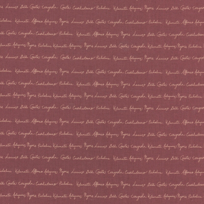 fabric with types of olives written in cursive on a warm purple background.