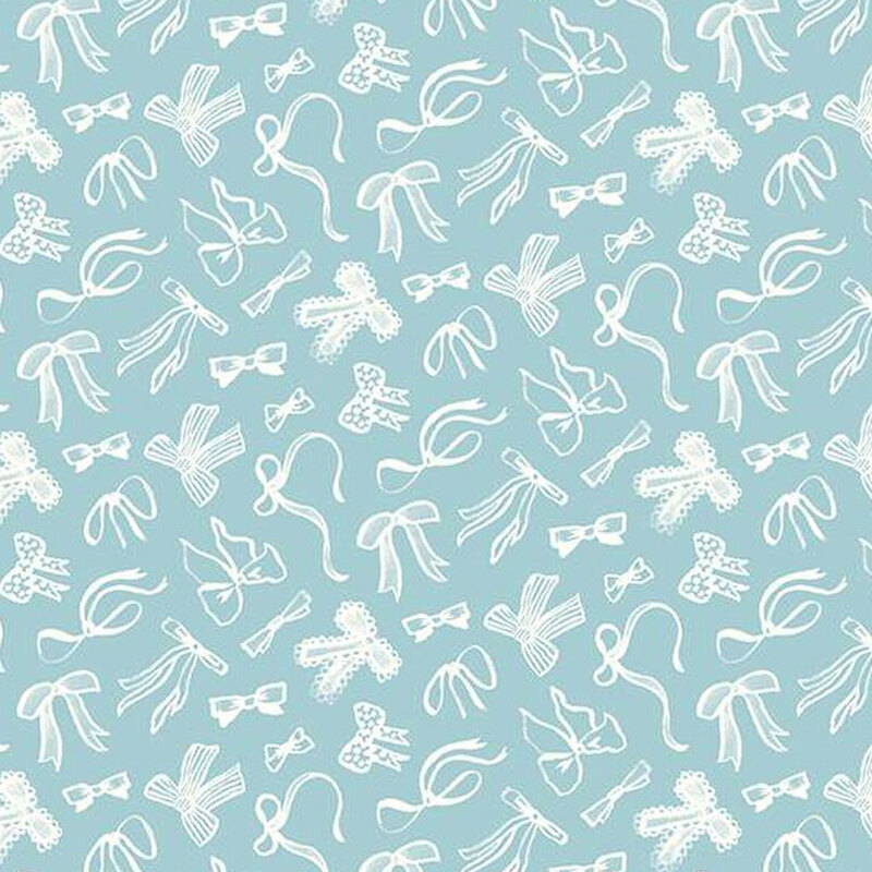 fabric pattern of white hair bows over a blue background