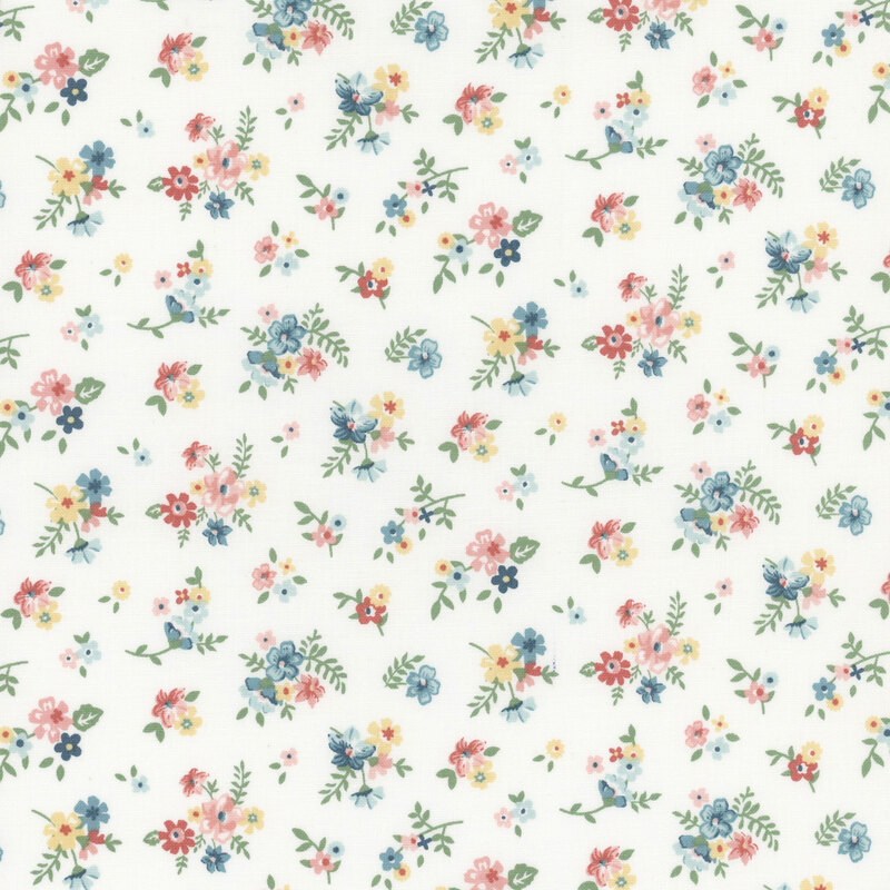 White fabric with tossed floral clusters.