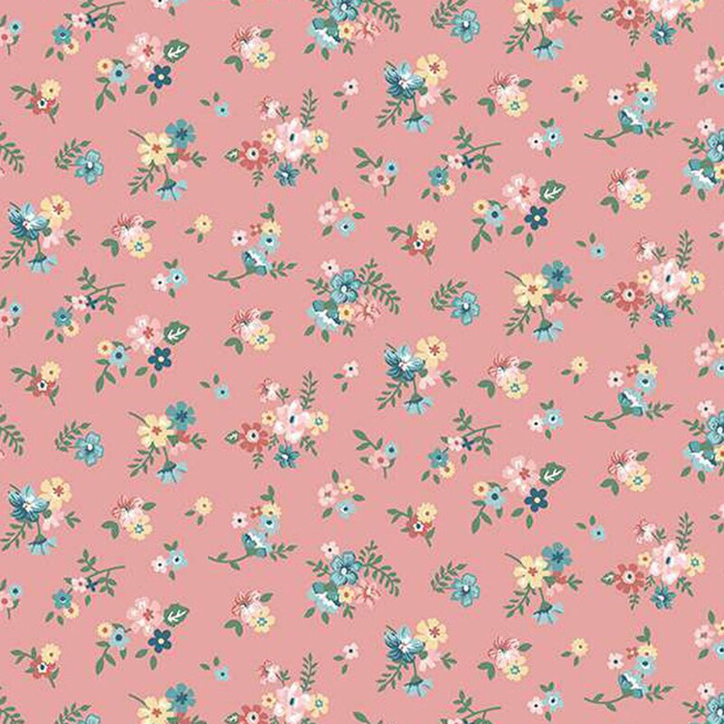 fabric pattern of groups of florals all over a pink background