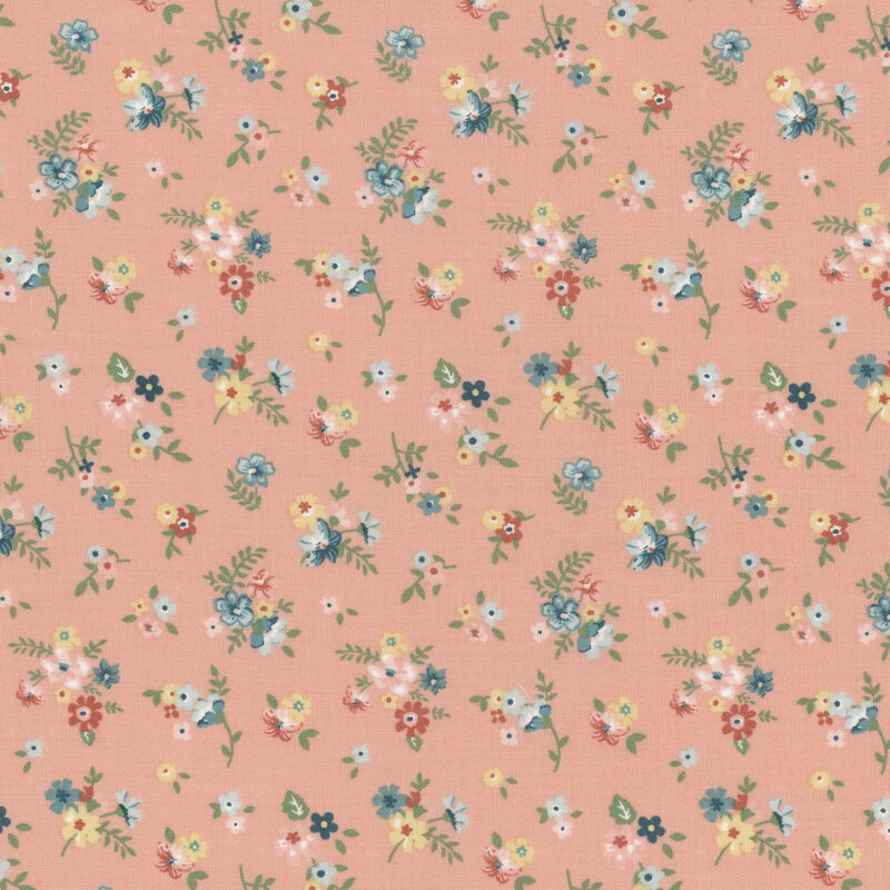 Coral pink fabric with tossed floral clusters.