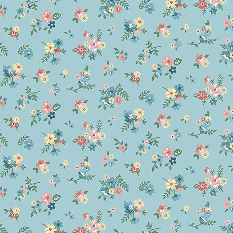 fabric pattern of groups of florals all over a blue background