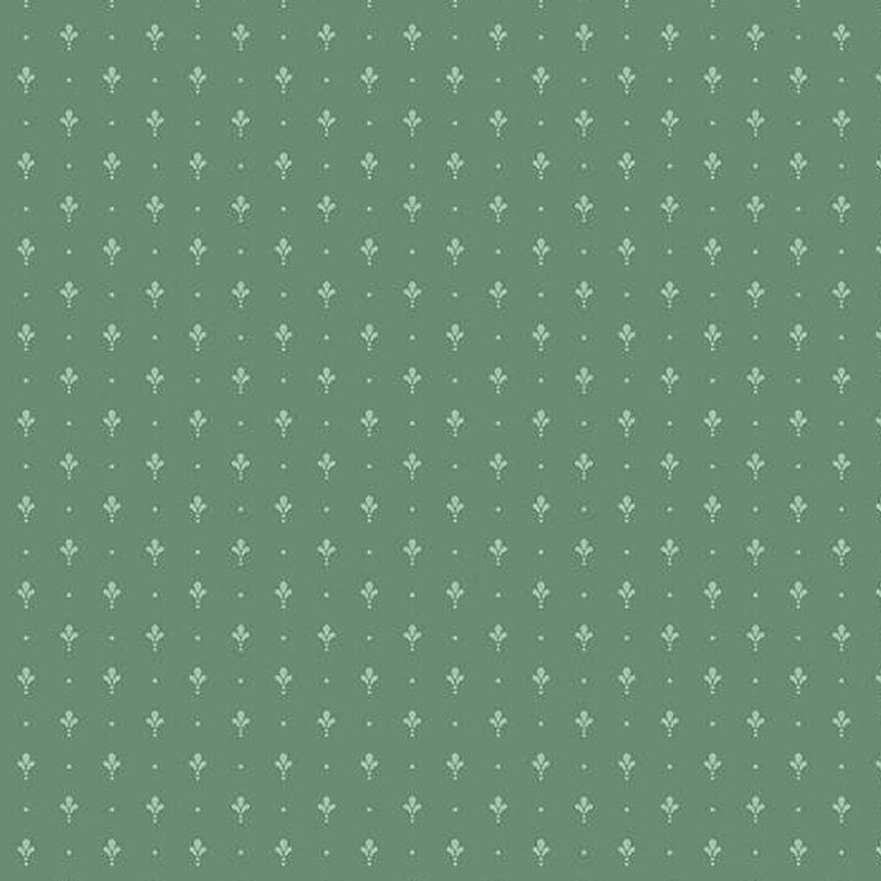 fabric pattern of light green playful motifs on a green background