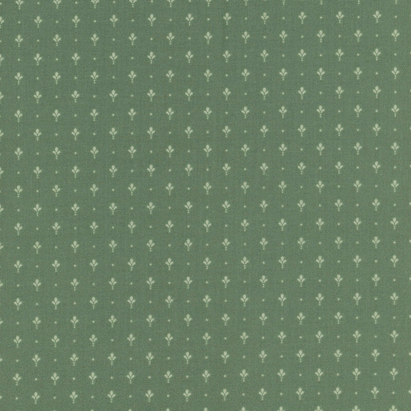 Lodgepole green fabric with a neat array of simplified light green fleur de lis.