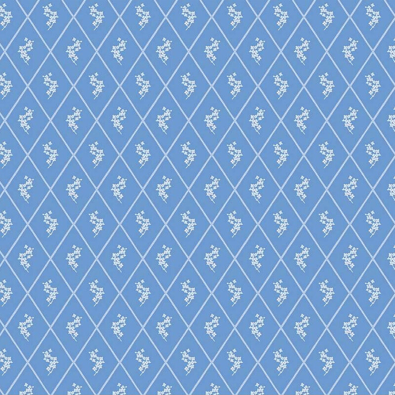 Repeating diamond pattern in light blue with small white floral designs.