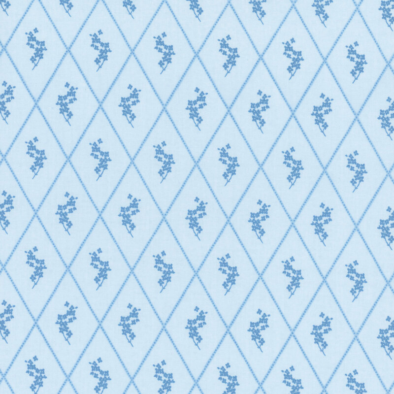 A tonal blue fabric featuring a diamond lattice design, with each diamond enclosing a small floral motif.
