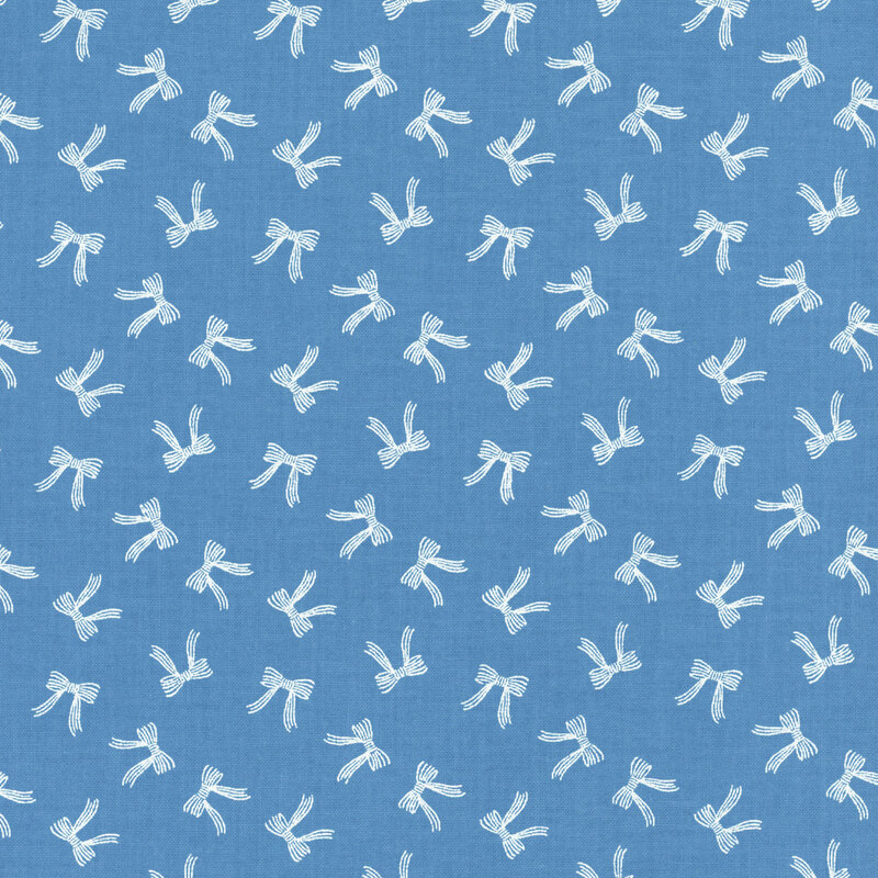 A blue fabric with tossed white bows.