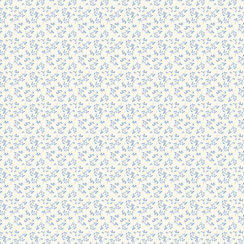 Cream fabric with a repeating blue leaf pattern