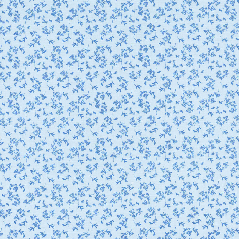 A tonal blue fabric with small tossed florals.