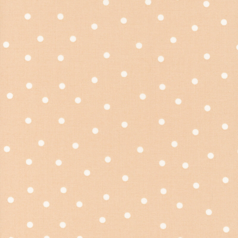 Blush pink fabric with scattered solid white polka dots.