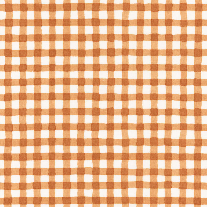 Watercolor gingham fabric in white and burnt orange.