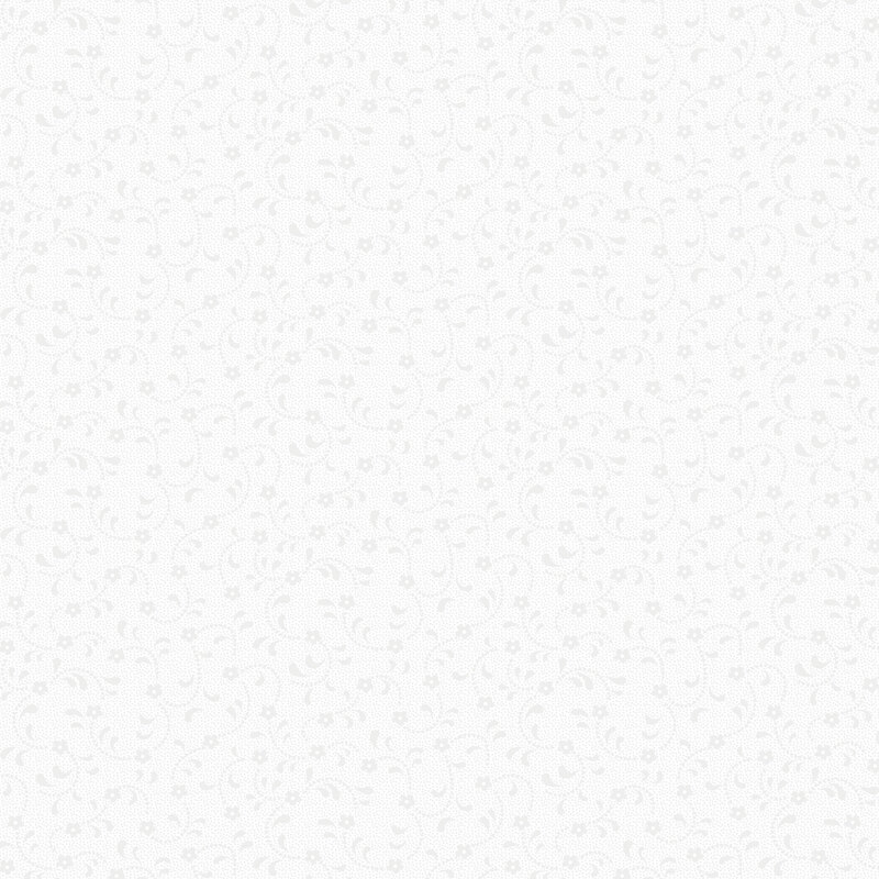 White fabric with tonal light gray florals swirling across it, show in gray and white.