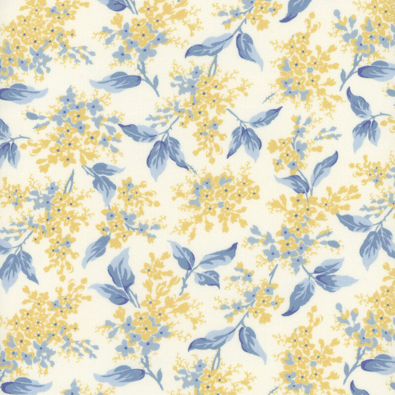 A floral pattern featuring blue and yellow flowers on a light cream background.