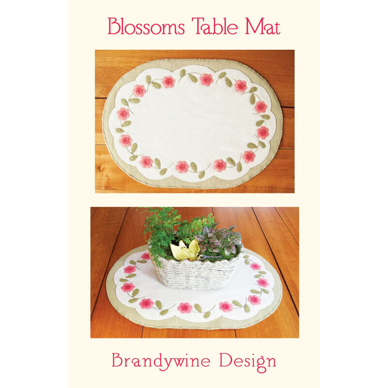 Image of a Blossoms Table Mat featuring floral designs on an oval shape, by Brandywine Design.