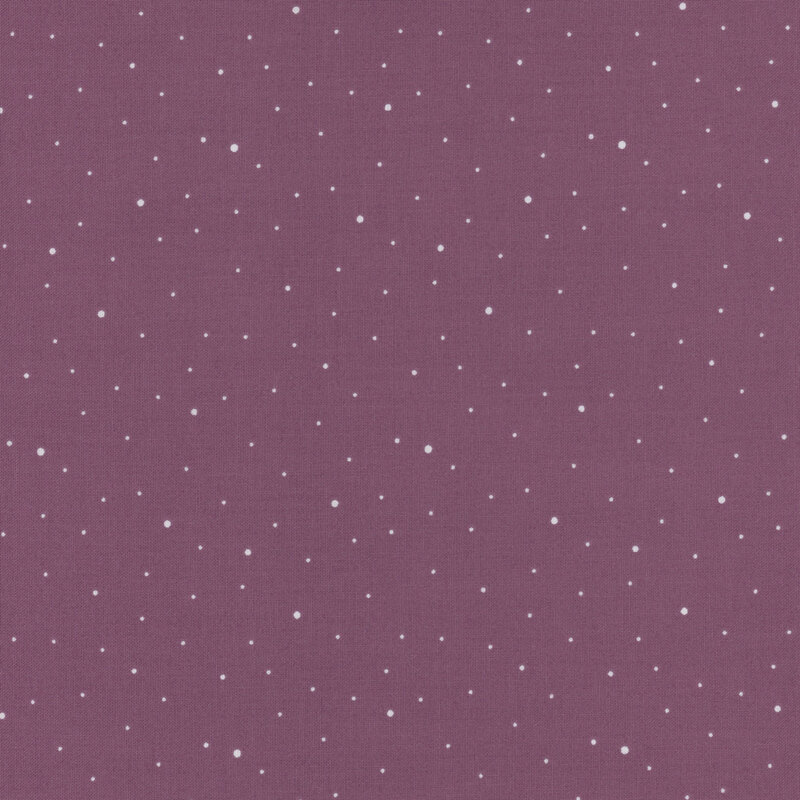 Purple fabric with scattered small white dots.