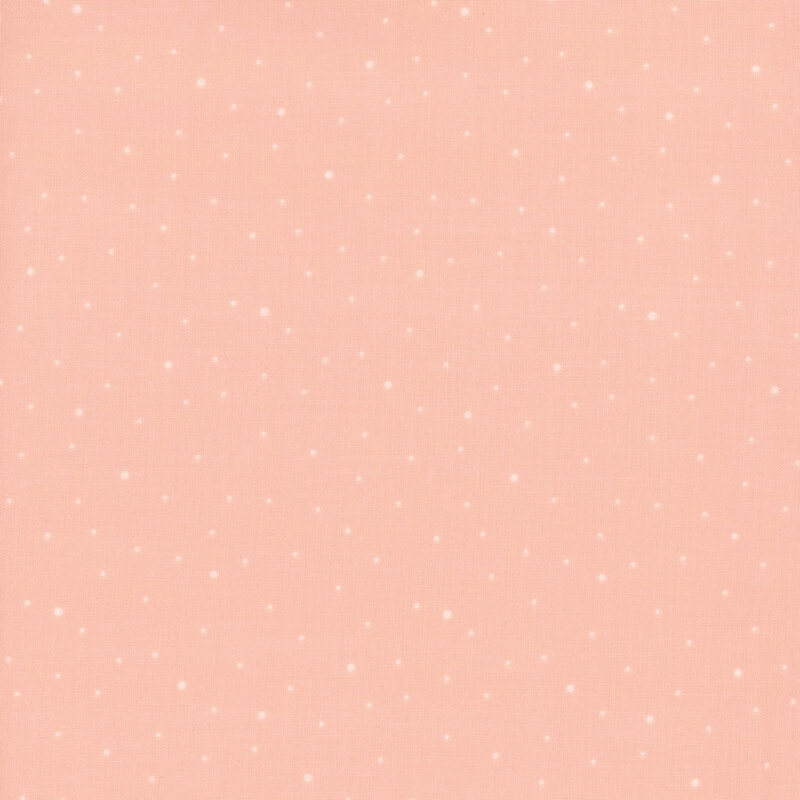 Light pink fabric with scattered small white dots.