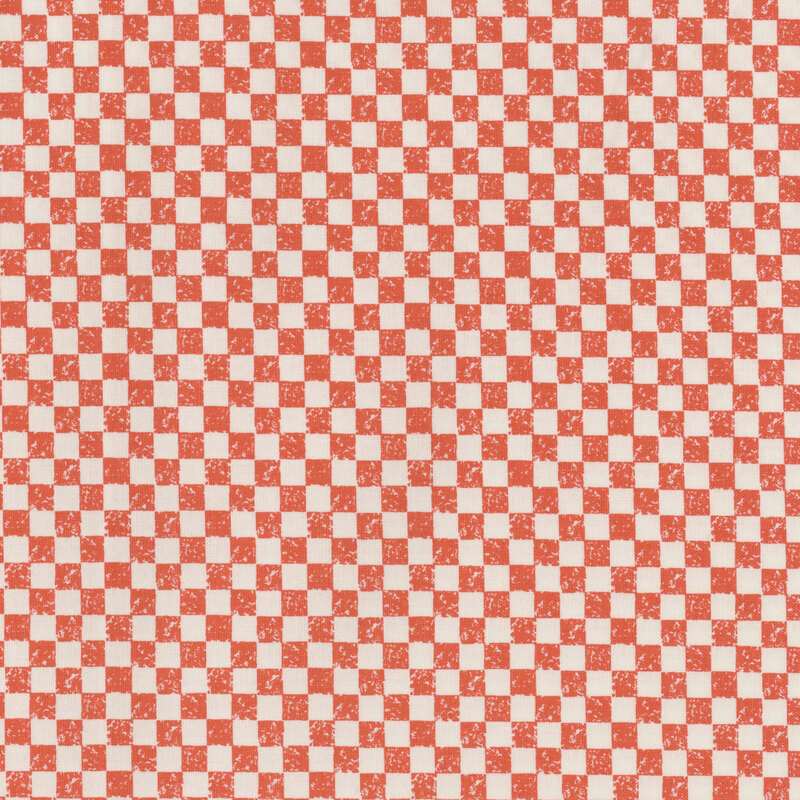 A orange and white checkered pattern with textured squares arranged in a grid.