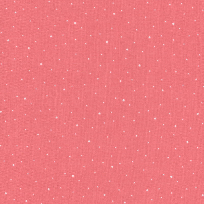 Coral pink fabric with scattered small white dots.