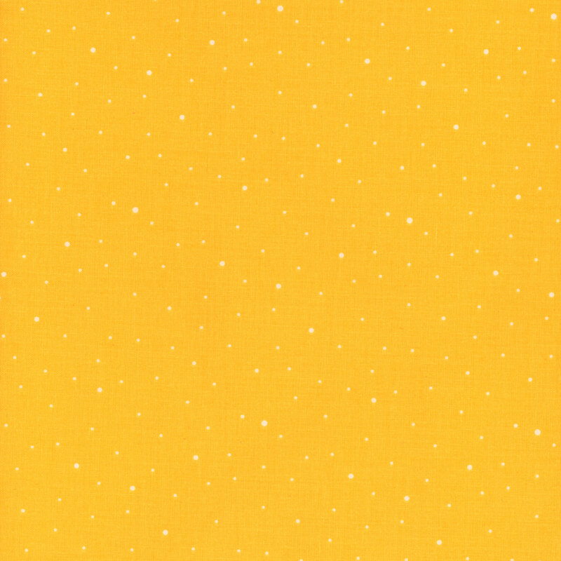 Bright yellow fabric with scattered small white dots.