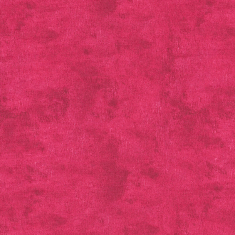 Mottled, textured, and tonal hot pink fabric swatch.