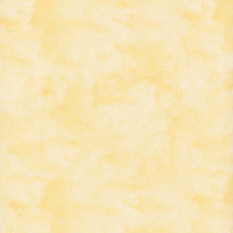 Mottled, textured, and tonal honey yellow fabric swatch.