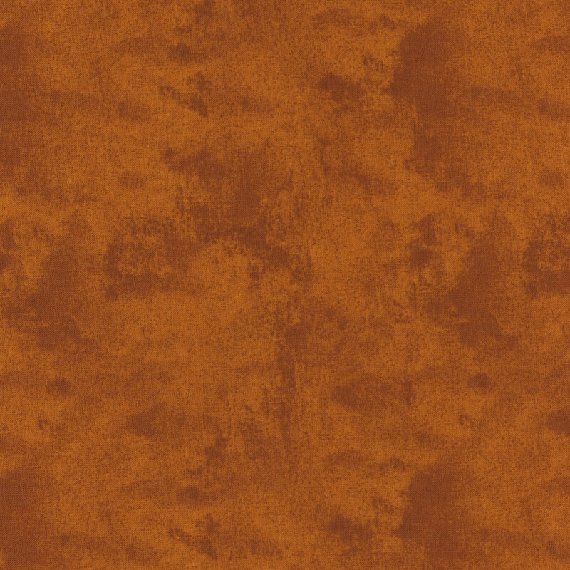 Mottled, textured, and tonal burnt sienna fabric swatch.