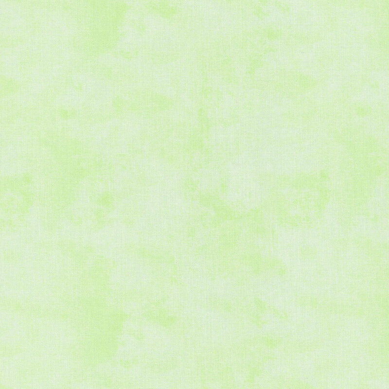 Mottled, textured, and tonal pastel green fabric swatch.