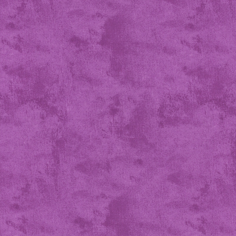 Mottled, textured, and tonal bright purple fabric swatch.