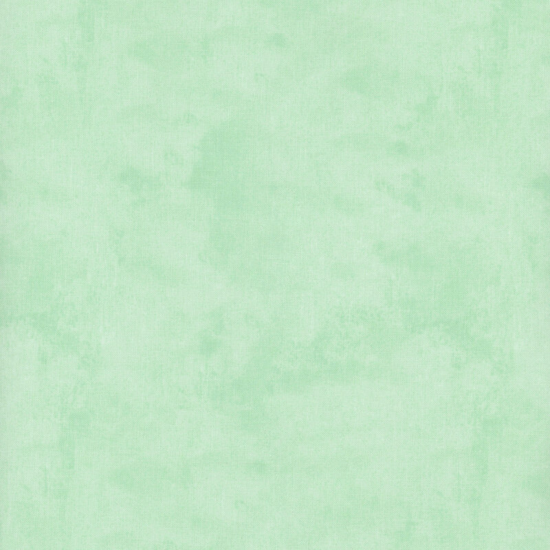 Mottled, textured, and tonal light jade fabric swatch.