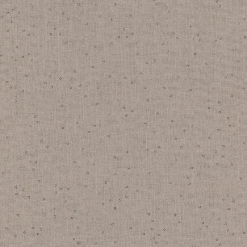 Light beige fabric with small, subtle dots in a scattered pattern across the surface.