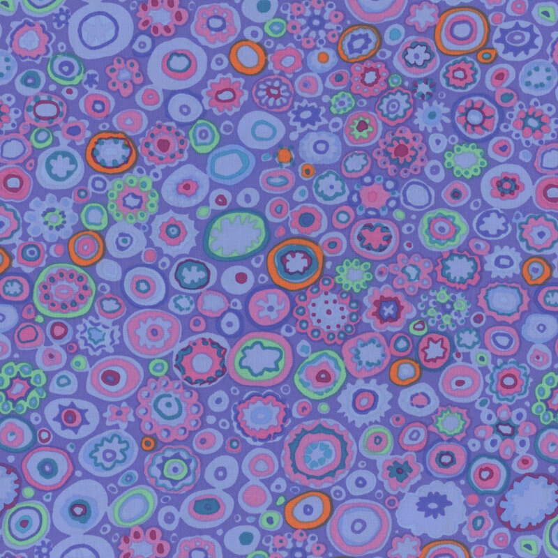 Abstract pattern of colorful circles on a purple background, featuring various sizes and hues.