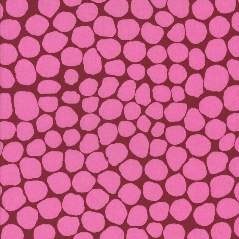 Pattern of irregular pink shapes on a deep burgundy background, resembling pebbles.