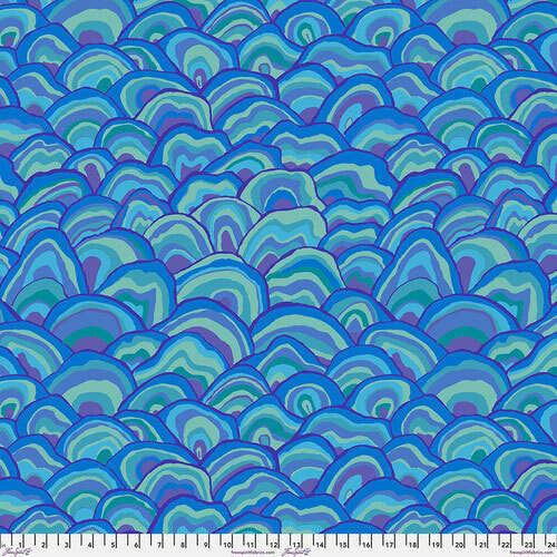 Seamless pattern of overlapping blue and turquoise scallop shapes with a wavy design.