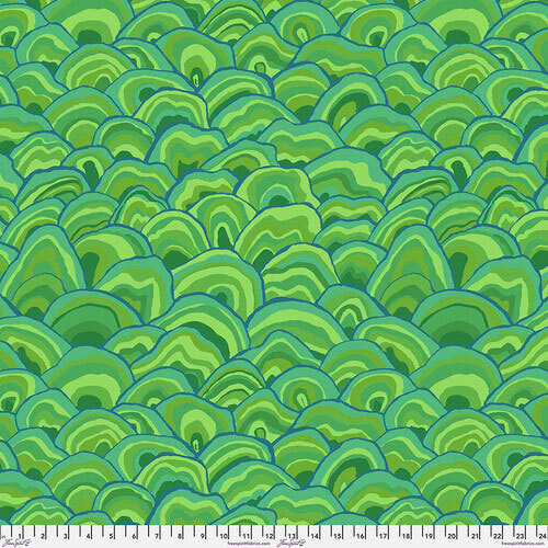 A patterned background of overlapping green scales in various shades, resembling aquatic elements.