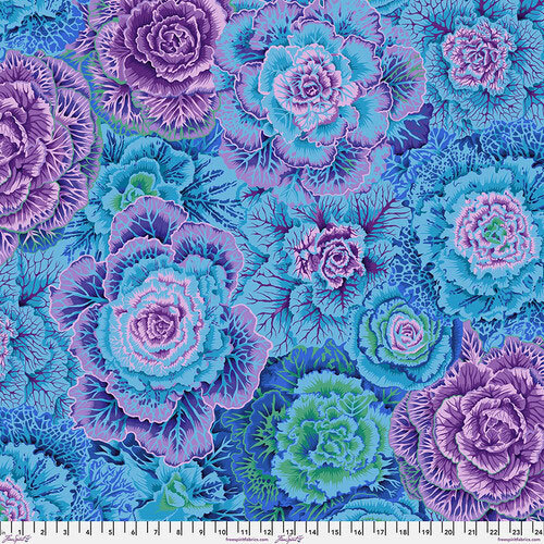 Colorful blue flowers with intricate details in shades of turquoise, pink, and purple.