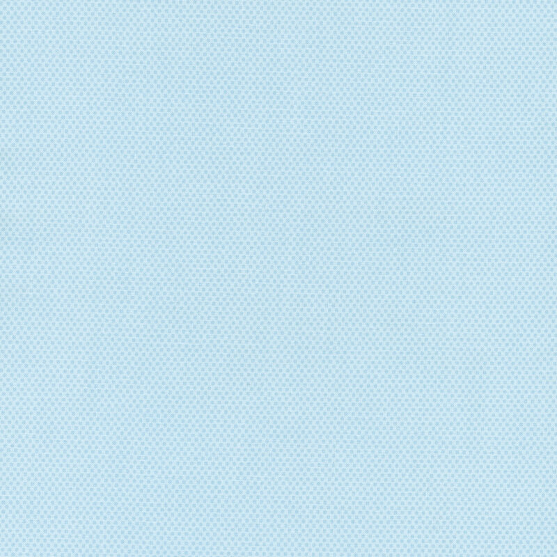 Boy blue fabric featuring a dotted halftone tonal print.