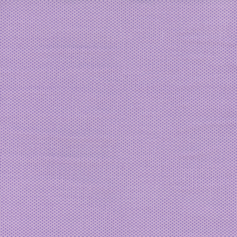 Lilac purple fabric featuring a dotted halftone tonal print.