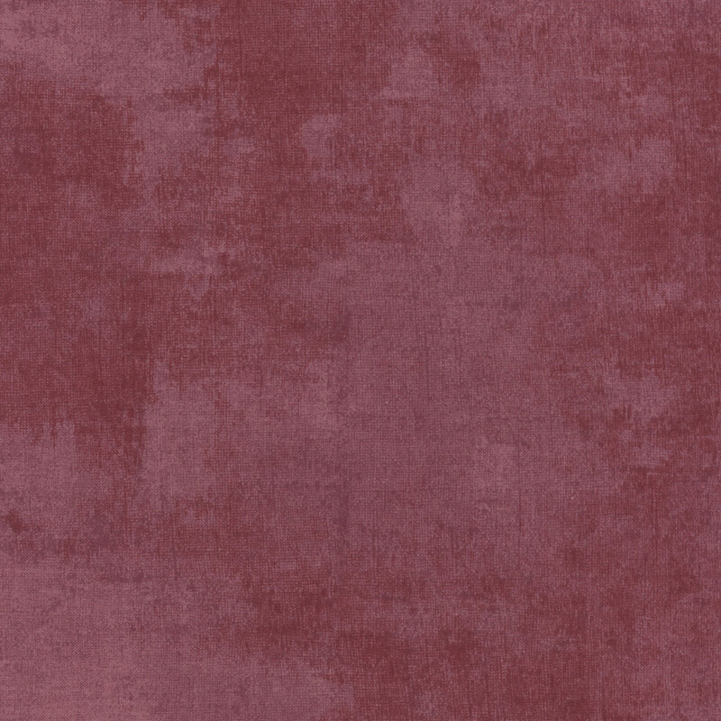 Wine red fabric featuring dry-brushed texturing