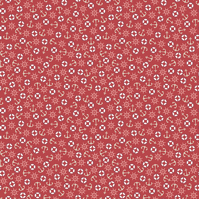 Red fabric with a tossed pattern of ship wheels, anchors, and life preservers.