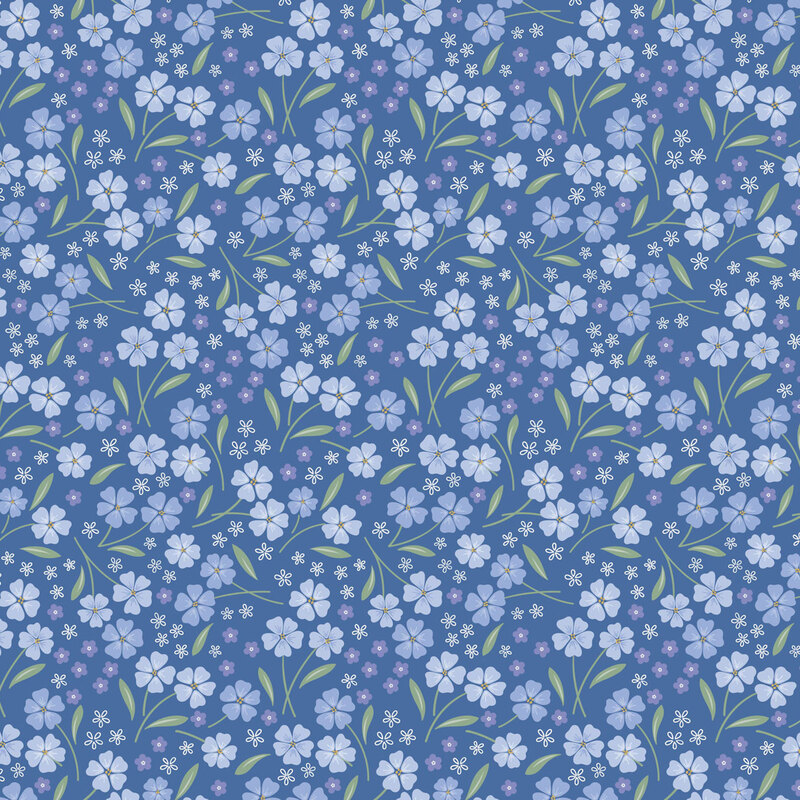 fabric pattern of white and red florals all on a blue background